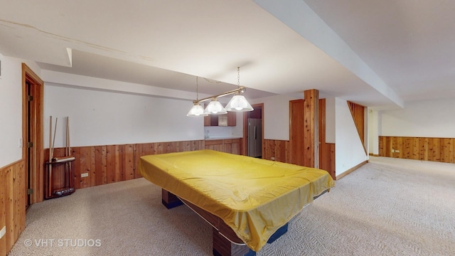 rec room featuring wooden walls, light colored carpet, and billiards