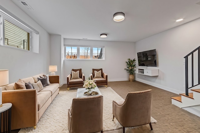 living room with light colored carpet