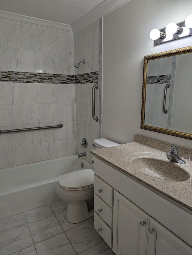 full bathroom featuring tiled shower / bath combo, toilet, crown molding, and vanity