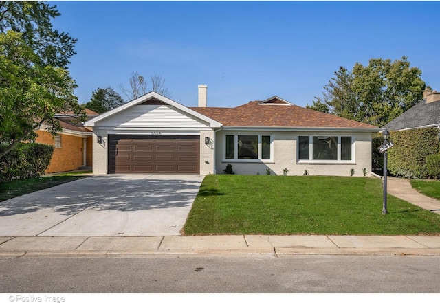 single story home with a garage and a front lawn