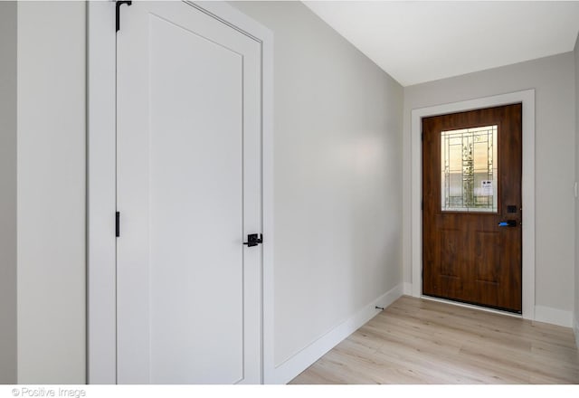 entrance foyer with light hardwood / wood-style floors