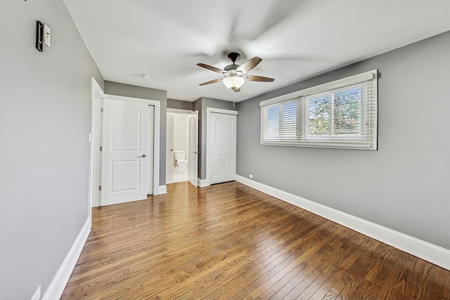 unfurnished bedroom with hardwood / wood-style floors and ceiling fan