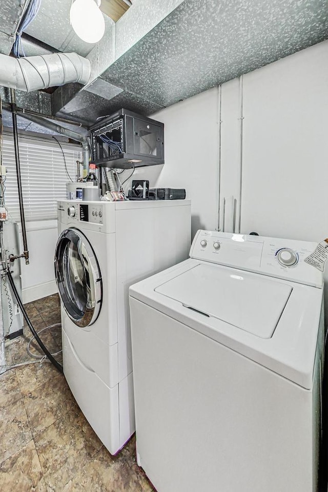 laundry area featuring separate washer and dryer