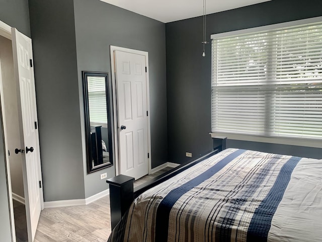 bedroom featuring light wood-type flooring