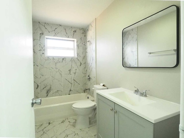 full bathroom featuring vanity, toilet, and tiled shower / bath combo