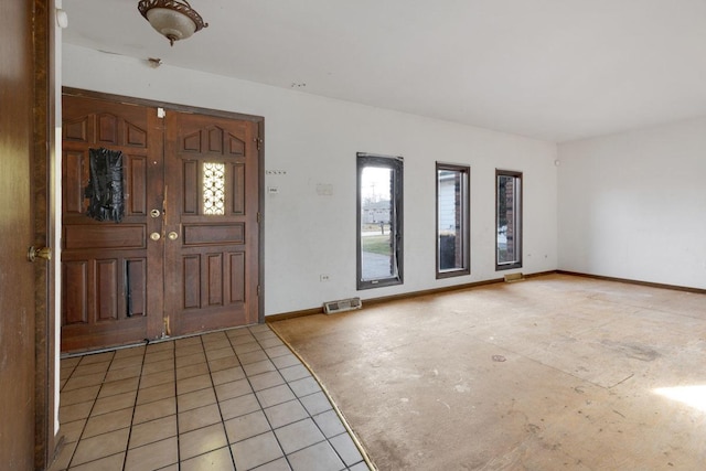 view of tiled entrance foyer