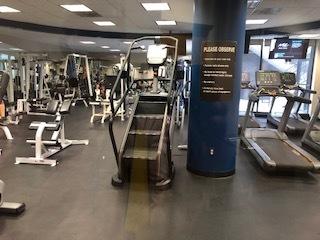 workout area with a paneled ceiling