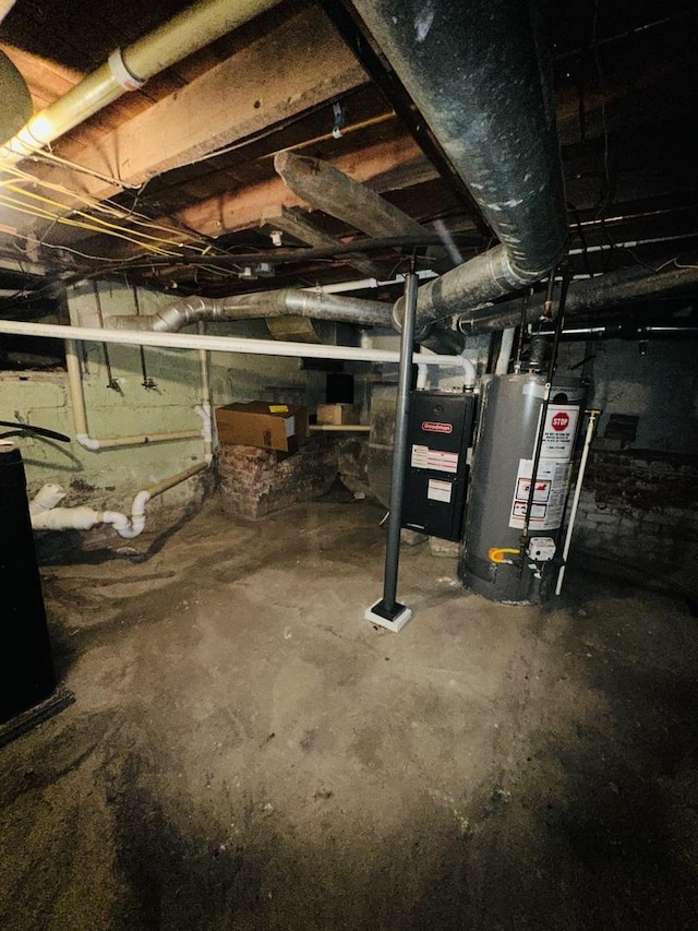 basement featuring water heater