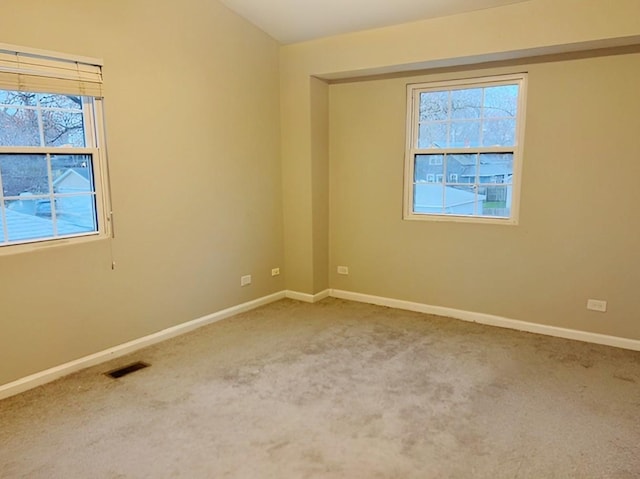 view of carpeted spare room