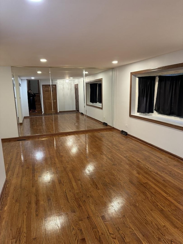 empty room featuring wood-type flooring