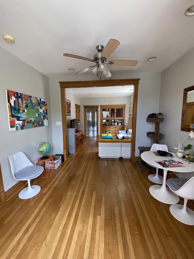 dining area featuring hardwood / wood-style flooring and ceiling fan