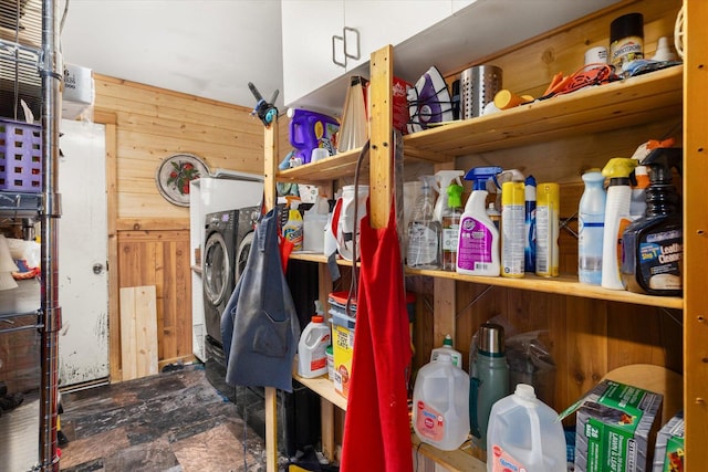 storage area featuring washer and clothes dryer