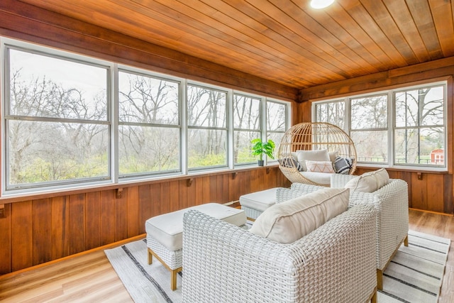 sunroom with wooden ceiling