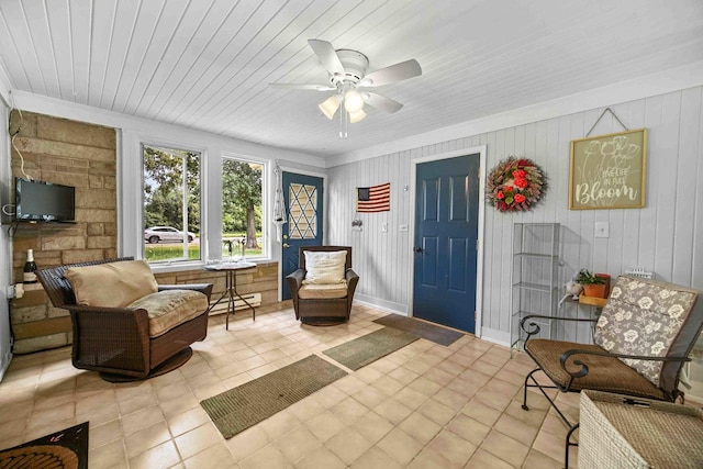 sitting room with ceiling fan, light tile patterned flooring, wooden ceiling, and baseboard heating