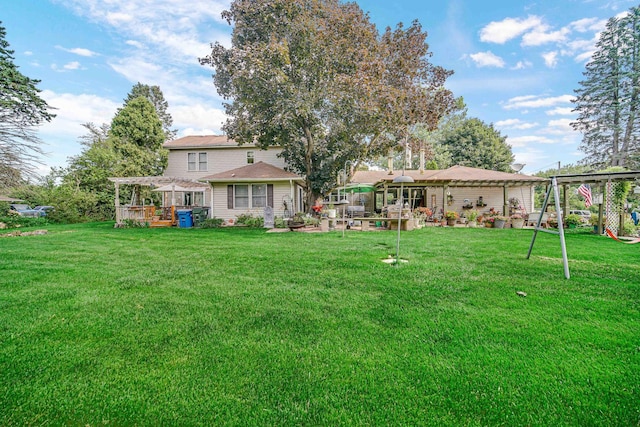 view of yard with a pergola