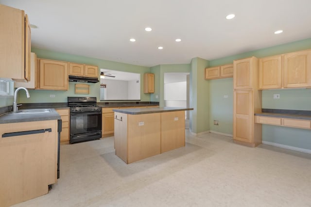 kitchen with black gas stove, a kitchen island, light brown cabinetry, and sink