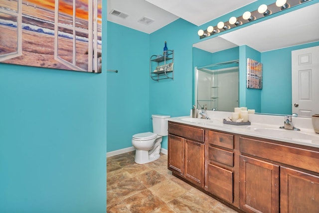 bathroom with a shower, vanity, and toilet