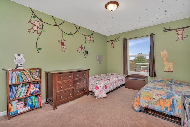 bedroom featuring light colored carpet