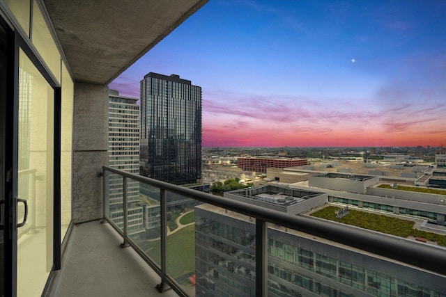 view of balcony at dusk