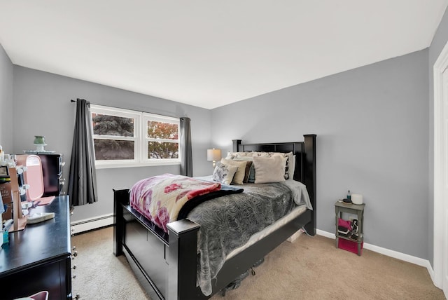 bedroom with light colored carpet and a baseboard radiator