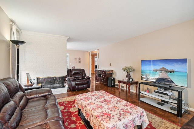 living room featuring a fireplace