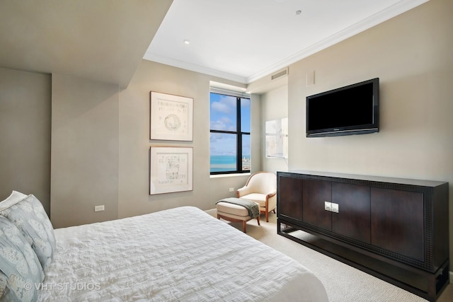 bedroom featuring light colored carpet and crown molding