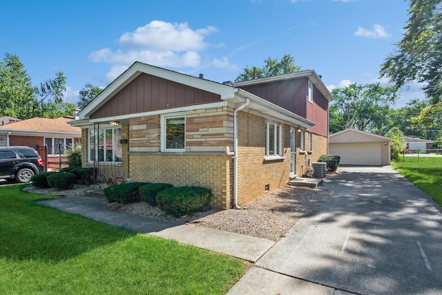 view of home's exterior featuring central AC unit, an outdoor structure, and a garage