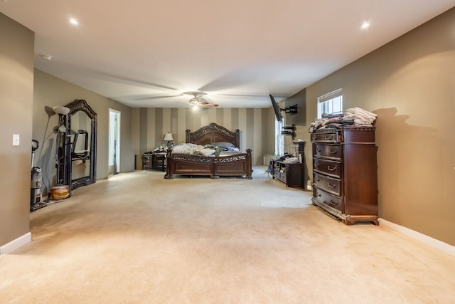 carpeted bedroom with ceiling fan