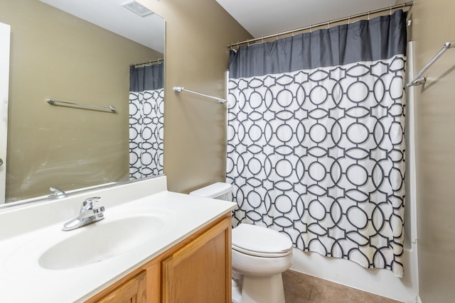 full bathroom featuring shower / bathtub combination with curtain, tile patterned flooring, vanity, and toilet