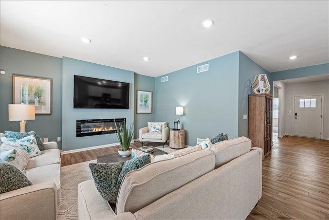 living room with wood-type flooring