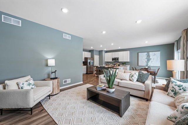 living room with light hardwood / wood-style floors