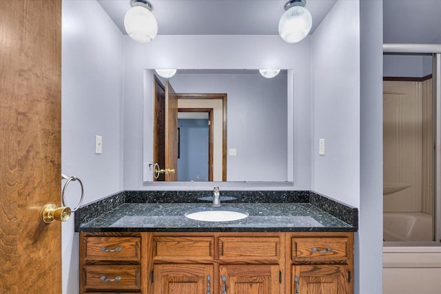 bathroom featuring vanity and shower / washtub combination