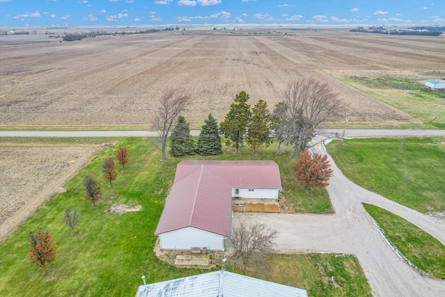 birds eye view of property featuring a rural view