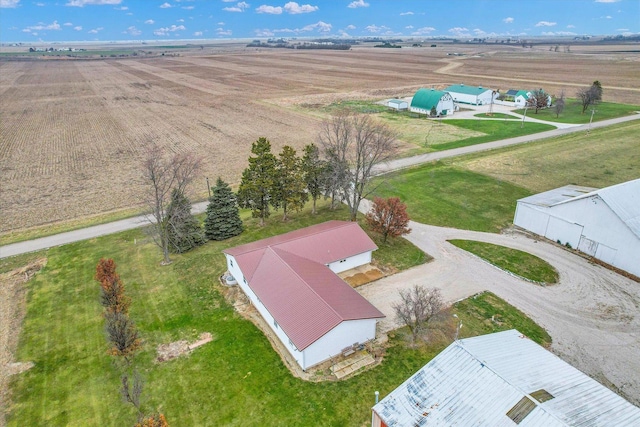 birds eye view of property featuring a rural view