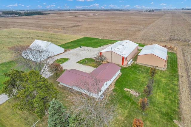 birds eye view of property featuring a rural view