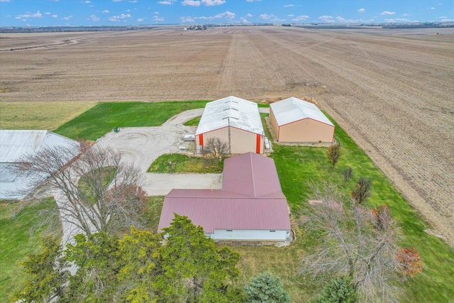 birds eye view of property featuring a rural view