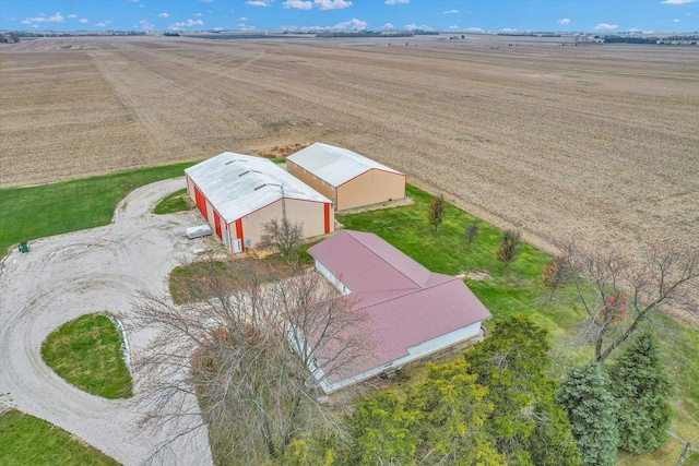 birds eye view of property featuring a rural view