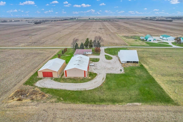 birds eye view of property with a rural view