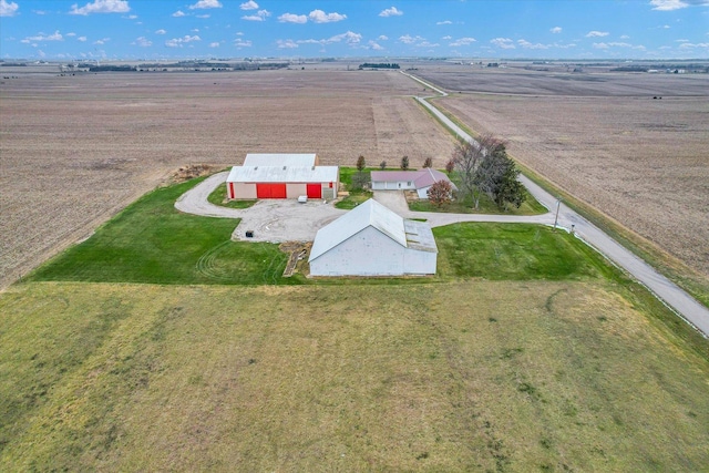 birds eye view of property with a rural view