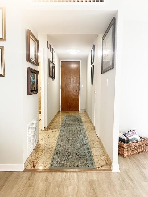 hallway featuring light hardwood / wood-style floors