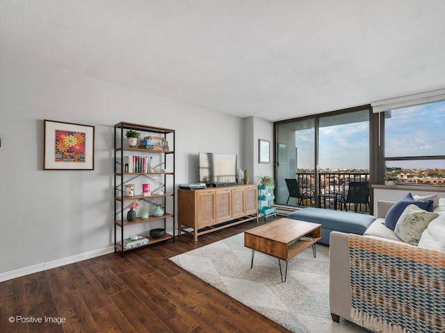 living room featuring a textured ceiling, dark hardwood / wood-style floors, and expansive windows