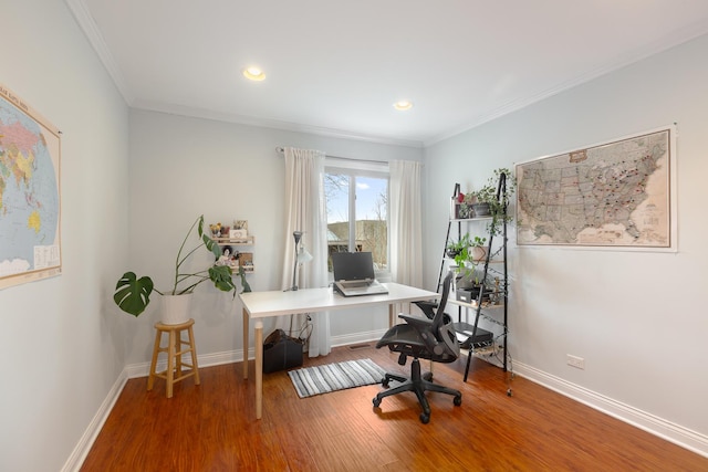 home office with hardwood / wood-style floors and crown molding