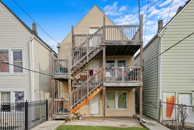 rear view of property with a patio