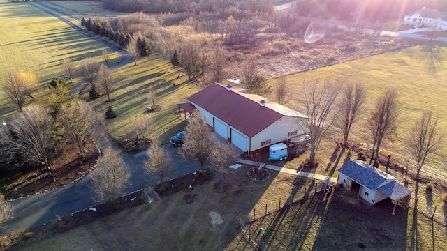 birds eye view of property featuring a rural view