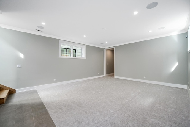 below grade area with crown molding, recessed lighting, baseboards, and visible vents