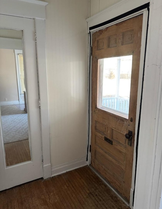 doorway to outside with dark wood-type flooring