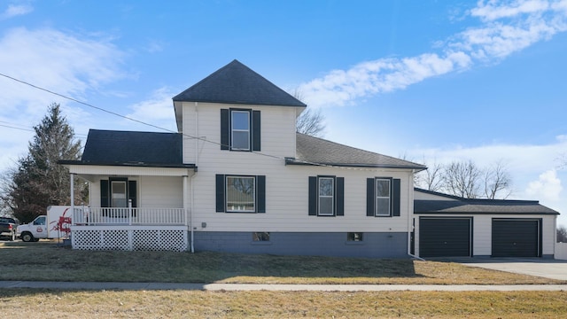 view of front facade featuring covered porch, a garage, a shingled roof, driveway, and a front lawn