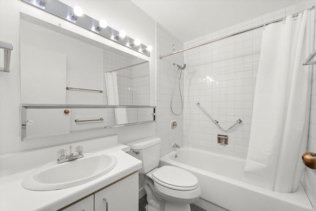 full bathroom featuring vanity, toilet, and shower / tub combo