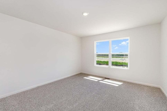 unfurnished room with carpet