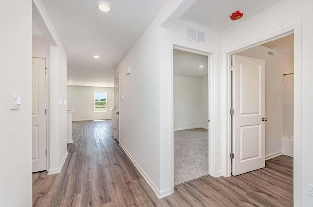 hall featuring wood-type flooring